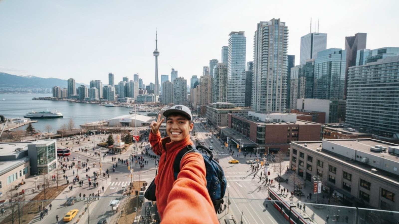 Boy taking a selfie in Toronto skyline